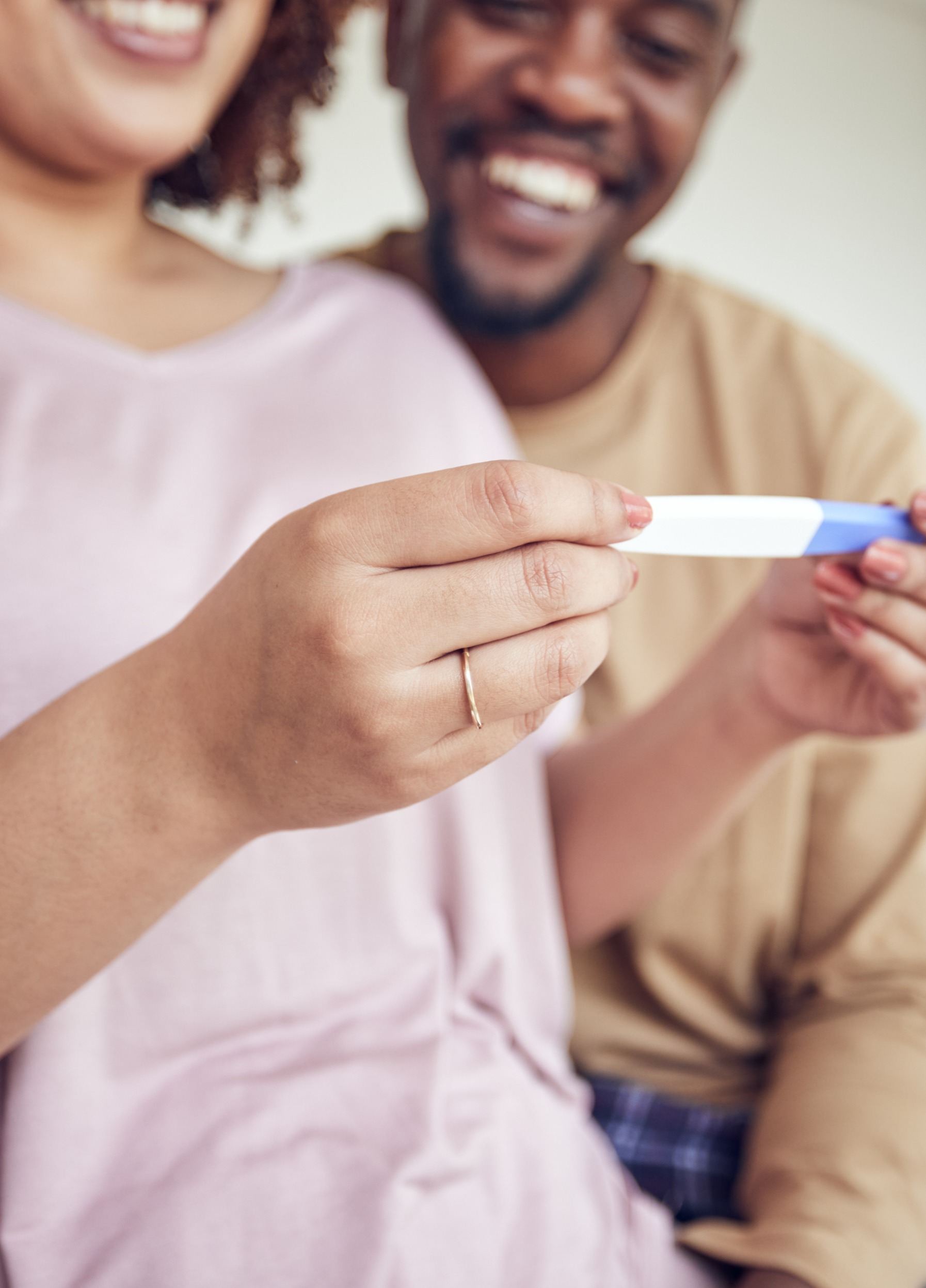 pregnancy-test-hands-happiness-with-fertility-people-having-baby-happy-couple-with-love-care-home-interracial-black-man-pregnant-woman-start-family-with-new-mother-father